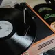 Black Vinyl Record on a Turntable